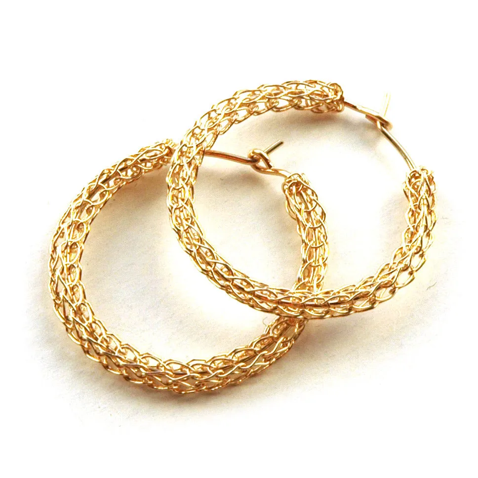 Gold hoop earrings , medium hoops