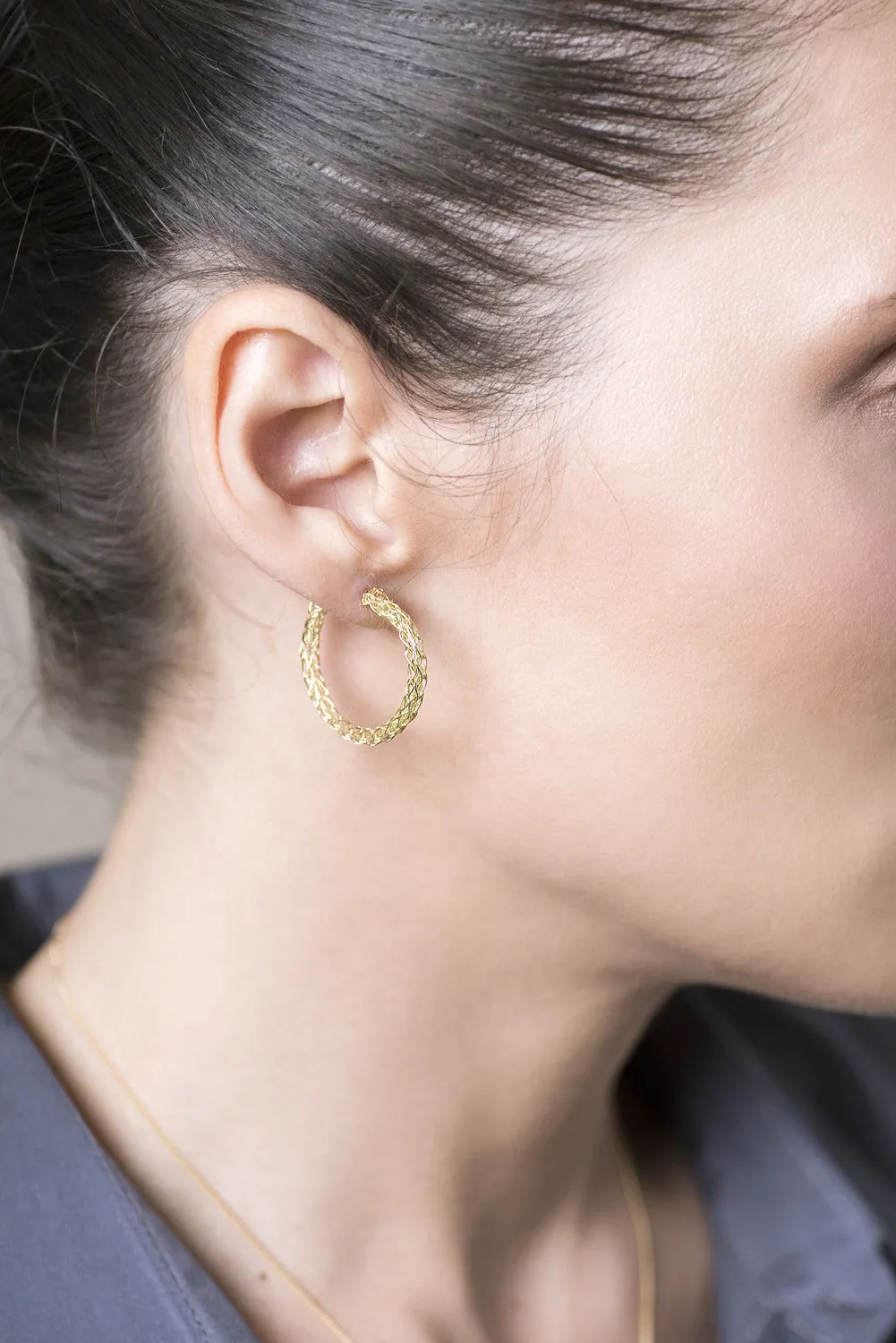 Gold hoop earrings , medium hoops